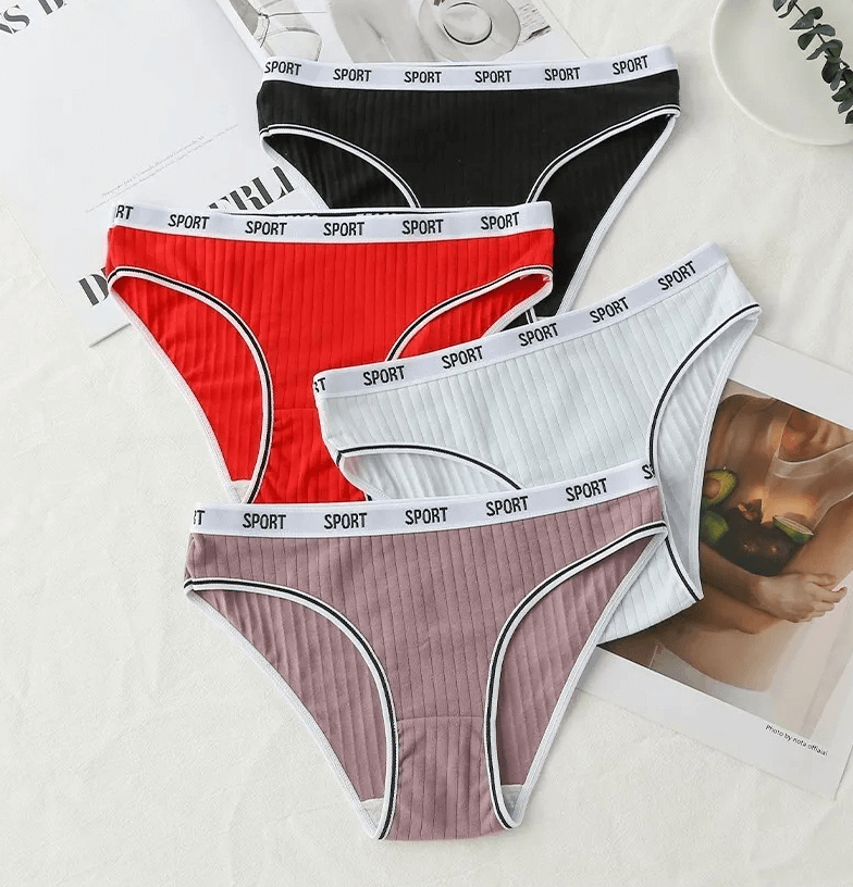 Assorted women's low-rise cotton panties in black, red, white, and purple with 'SPORT' waistband. Comfortable, breathable briefs for everyday wear.